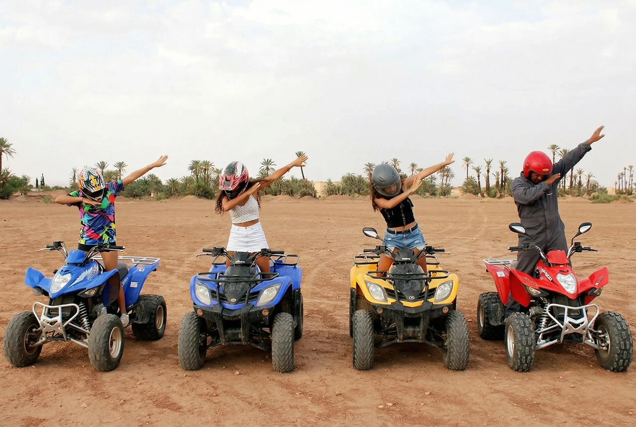 Quad Biking Marrakech desert adventure with people riding ATVs