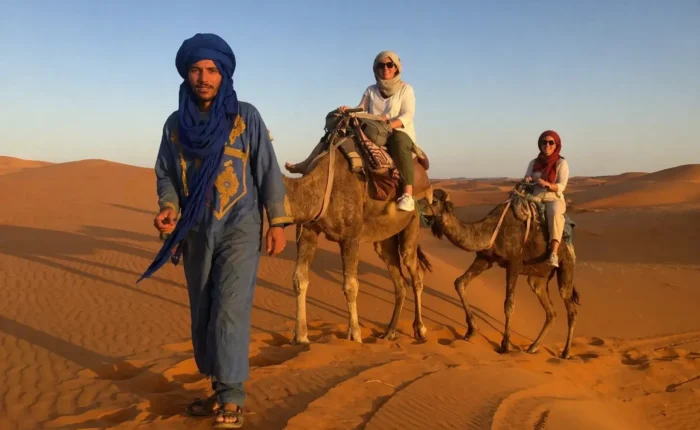 camel trekking during a 5 days Marrakech to Fes desert tour across the Sahara