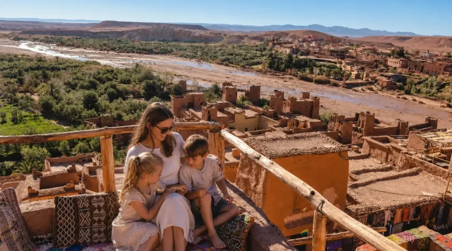 Family enjoying panoramic views of Ait Ben Haddou during the Marrakech to Merzouga desert tour