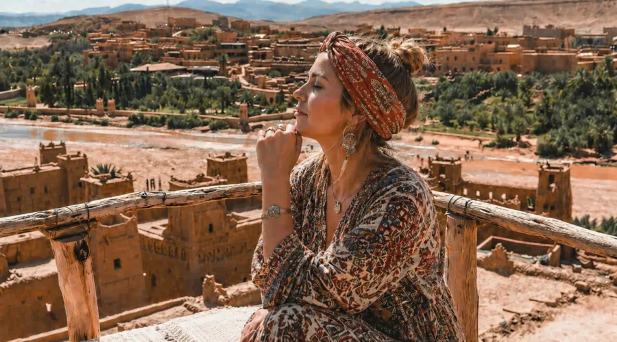 Traveler enjoying panoramic desert views near Ouarzazate in Morocco