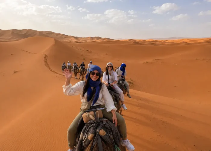 Camel trekking experience during the 9 days Morocco tour from Fes in the Sahara Desert of Merzouga