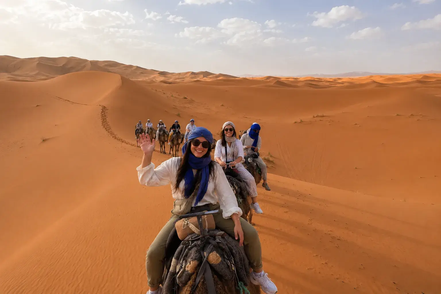 Camel trekking experience during the 9 days Morocco tour from Fes in the Sahara Desert of Merzouga